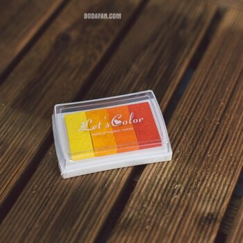 tintas-colores-dedos-huellas-naranja